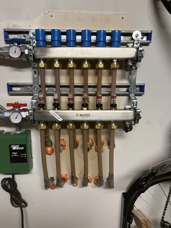 Plumber performing Leak Detection at a residential property in Surf City